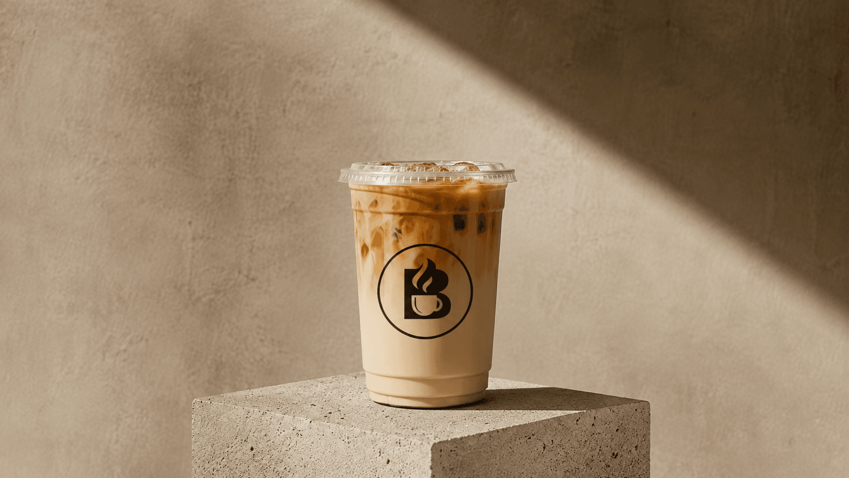 The Brew iced latte with the logo on the cup